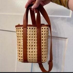 A New Day Woven Rattan Crossbody Bag with Brown Accents